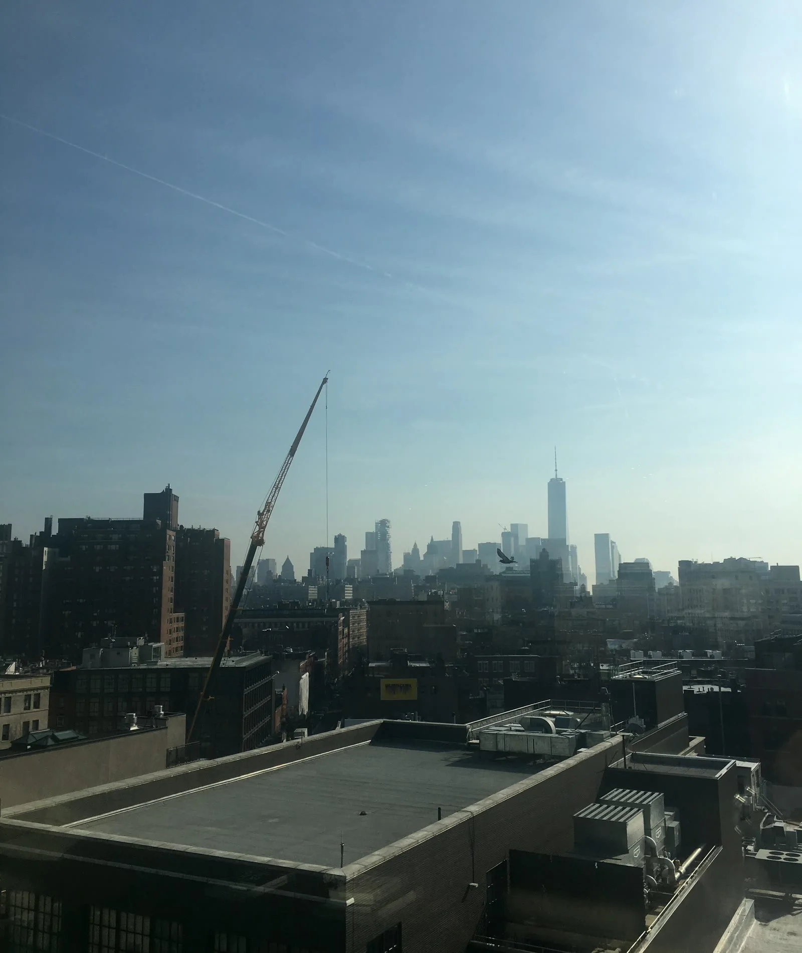New York City skyline with construction crane